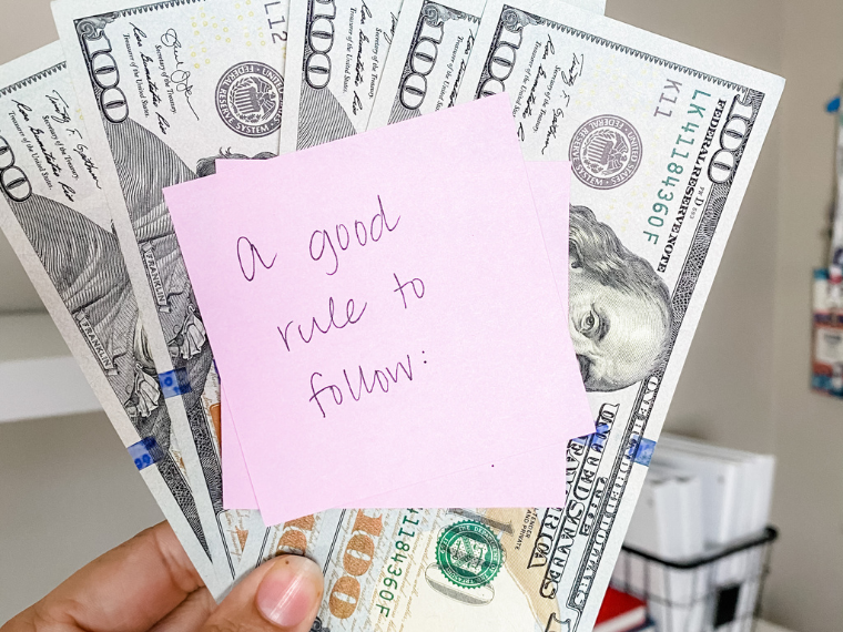 Money with a post it note