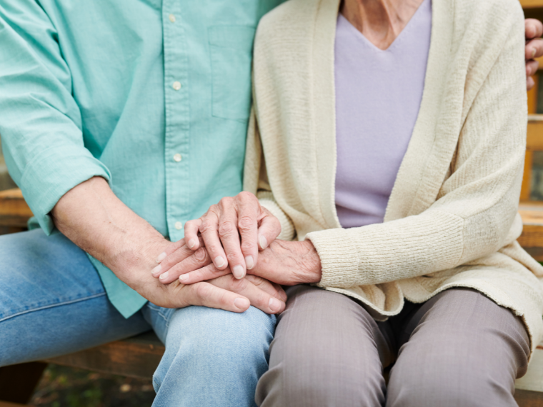 A couple holding hands