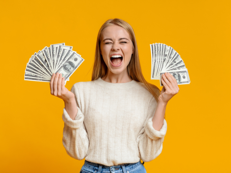 Teenager holding money