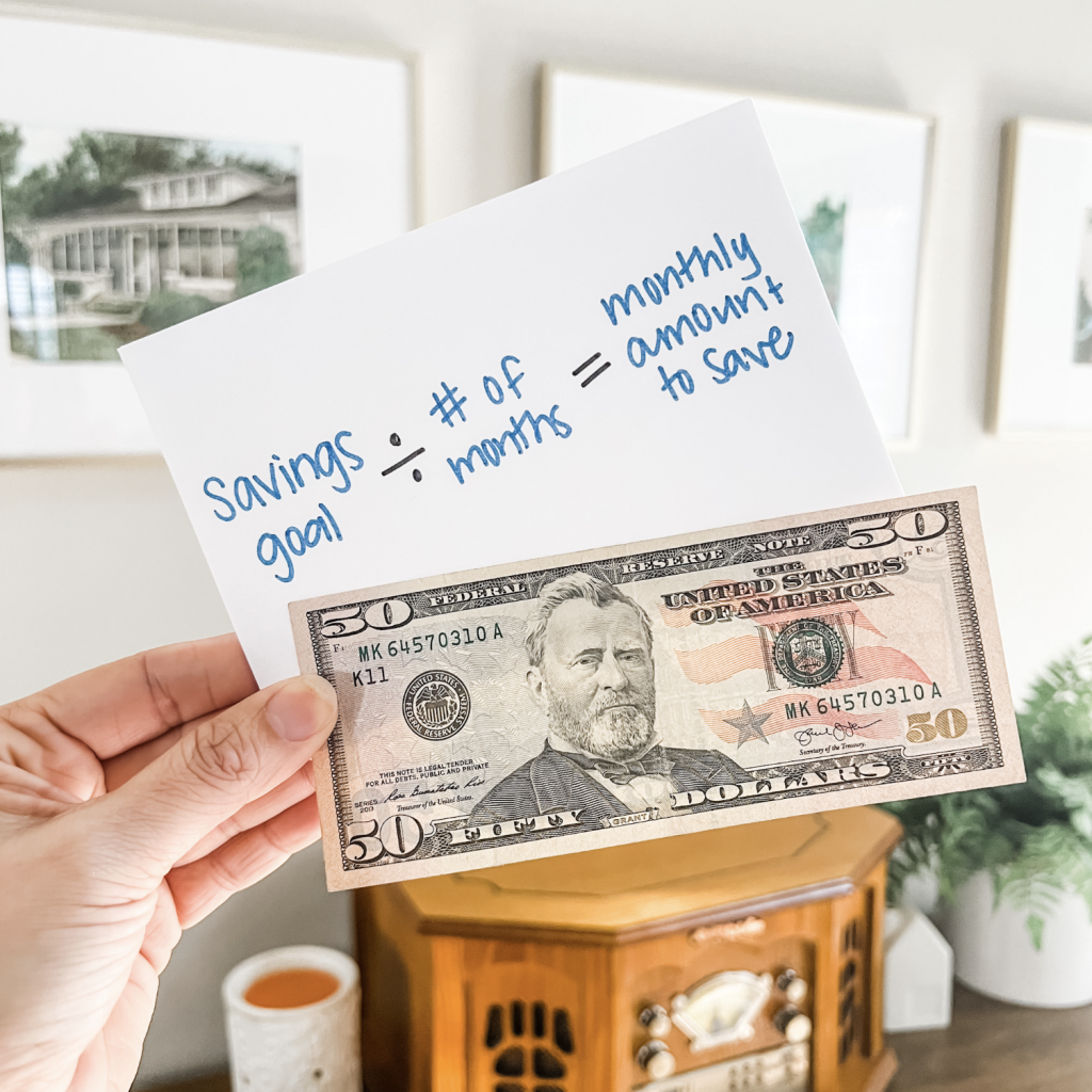 A 50 dollar bill and a written equation