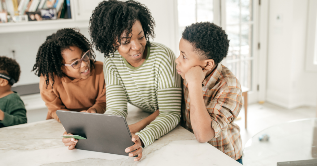 A mother and two children online shopping