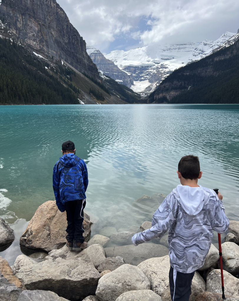 2 children playing in a lake